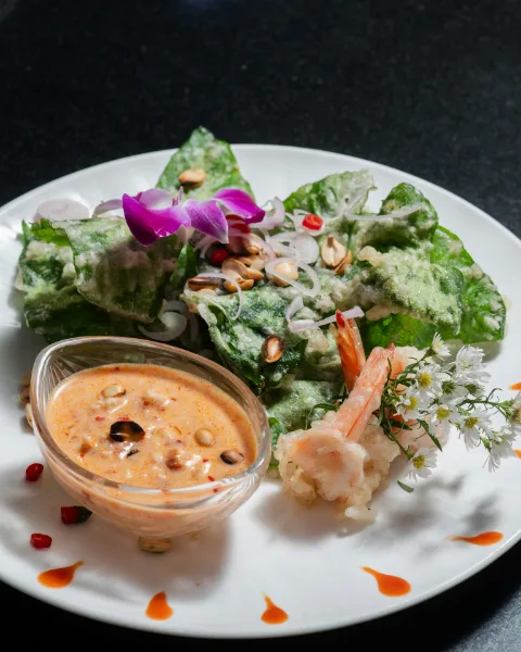 Crispy leaf salad with prawns, peanuts and a coconut dipping sauce