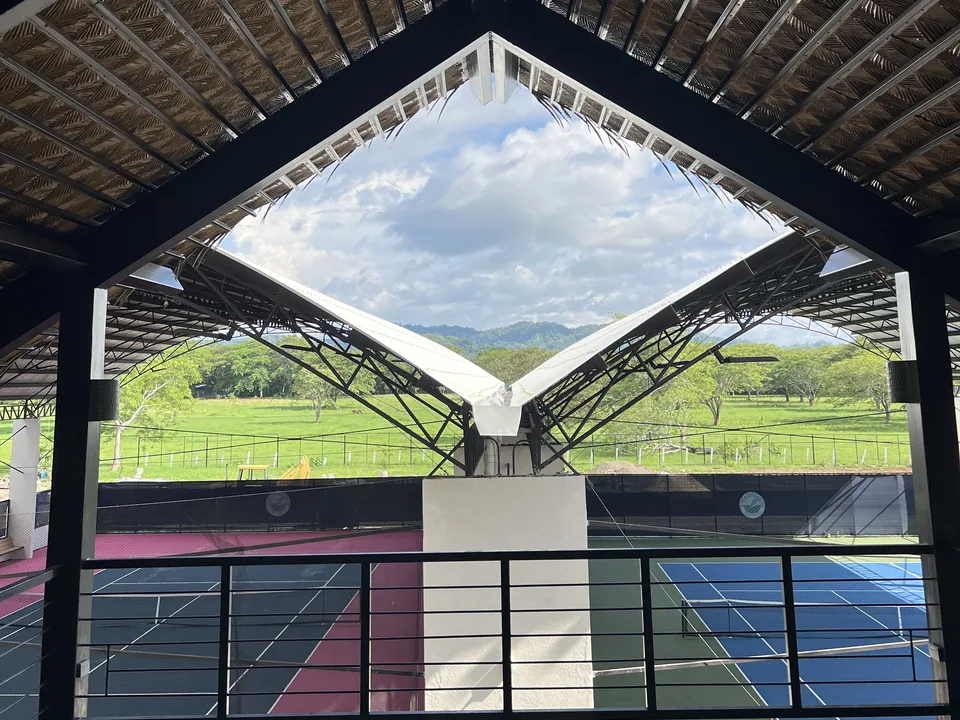 View from the pavilion deck across the courts to the hills